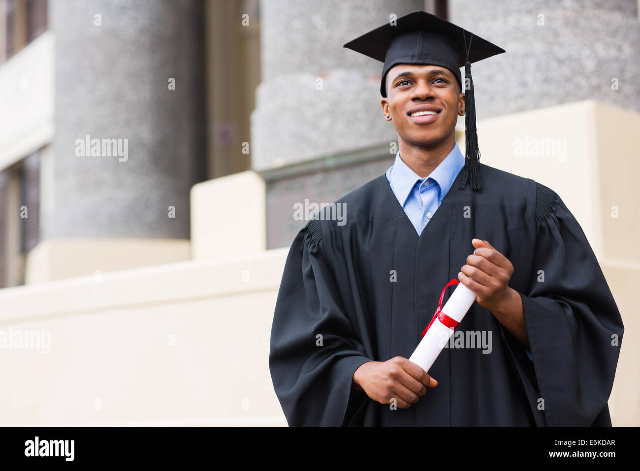 Male college graduate posing outdoors hi-res stock photography and images -  Alamy