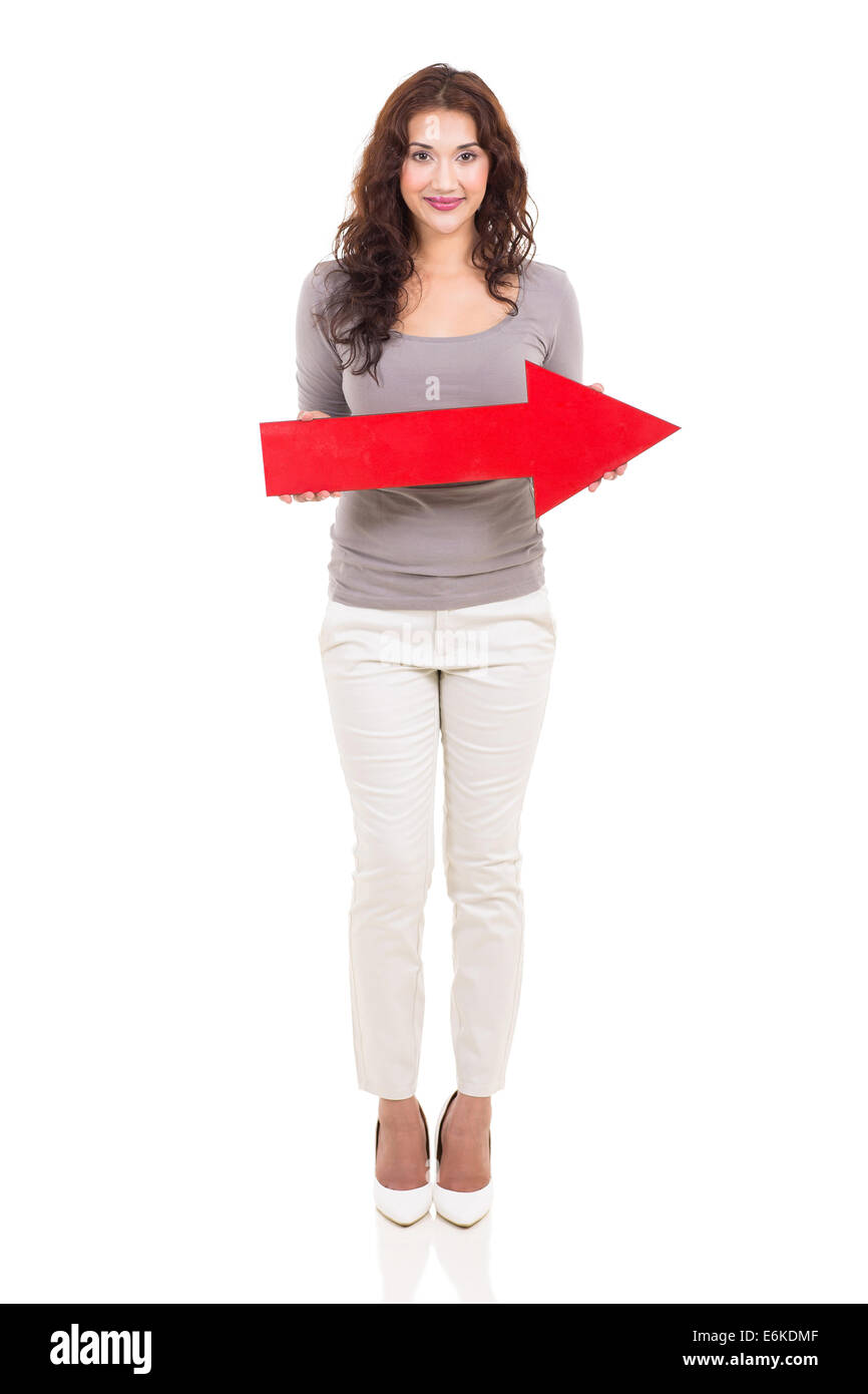 beautiful young woman holding arrow pointing right Stock Photo - Alamy