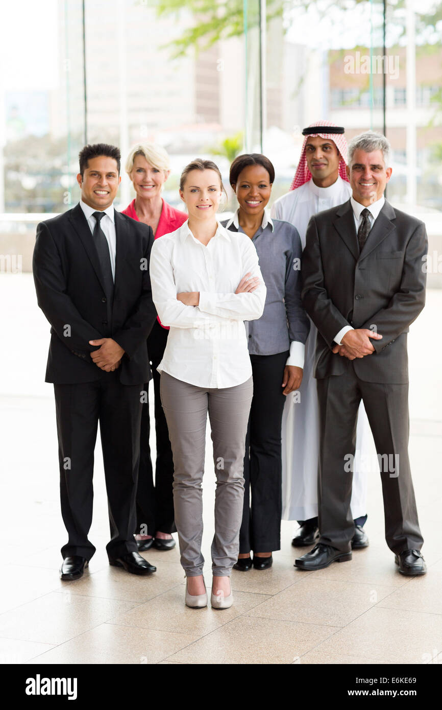 group of multiracial businesspeople standing together in office Stock ...