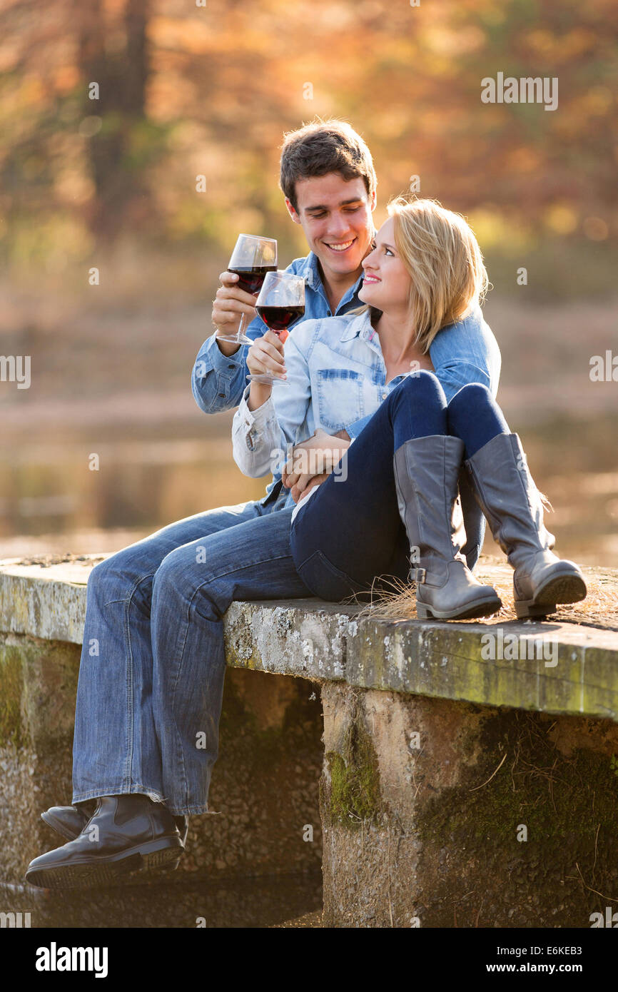 romantic couple drinking red wine outdoors Stock Photo - Alamy