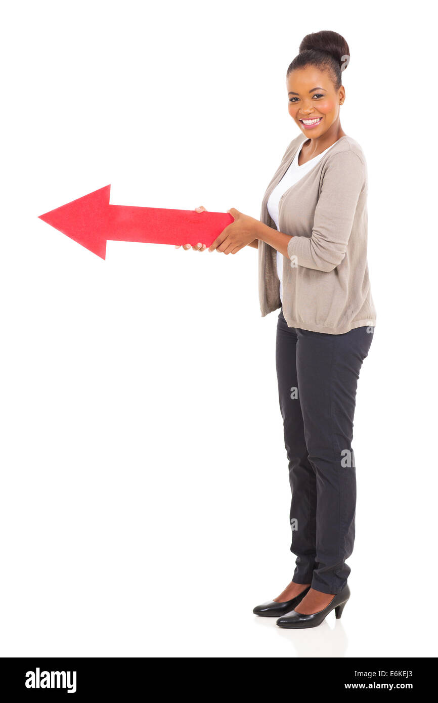 beautiful afro American woman holding red arrow isolated on white Stock ...