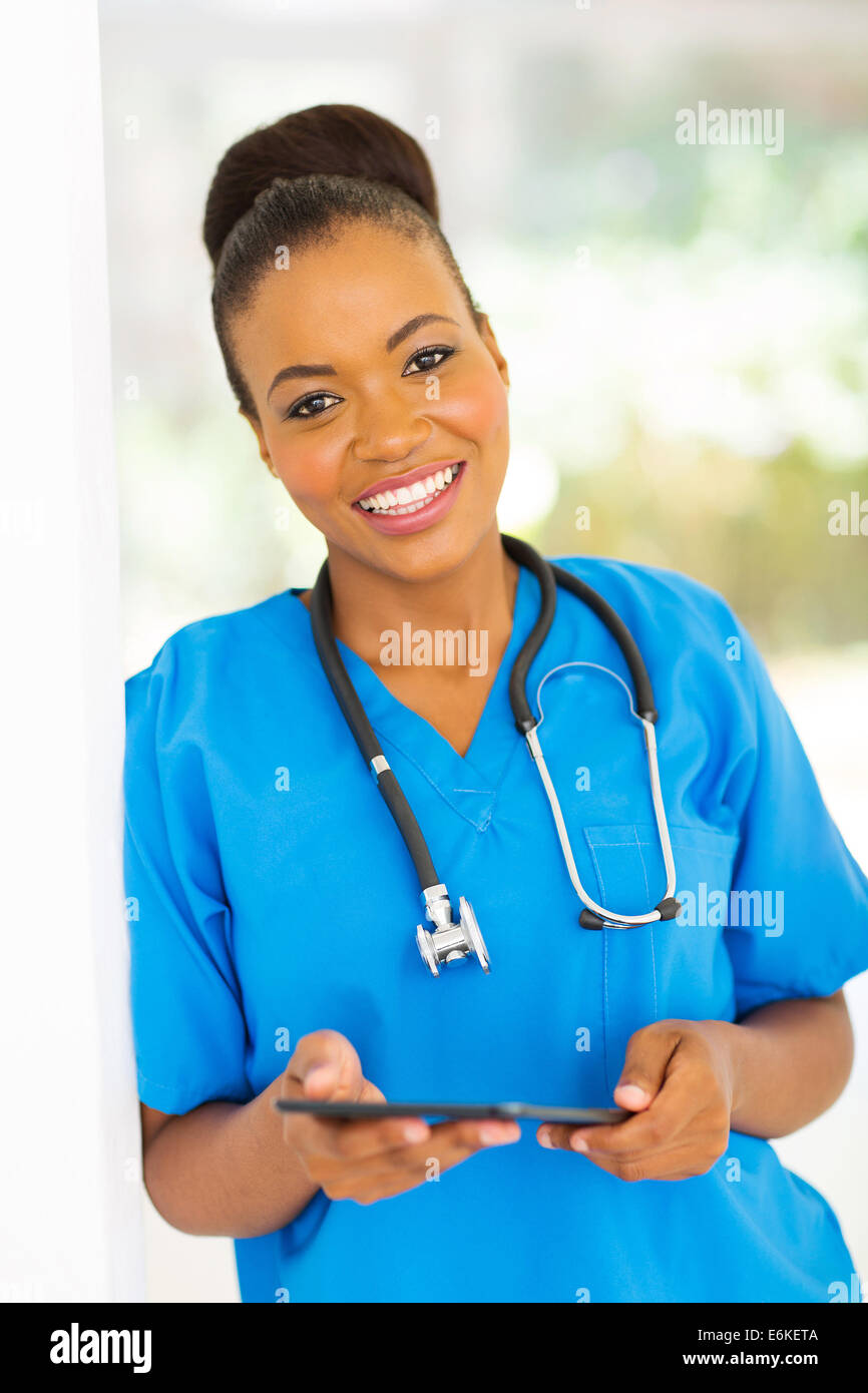 beautiful African American medical worker with tablet computer Stock Photo