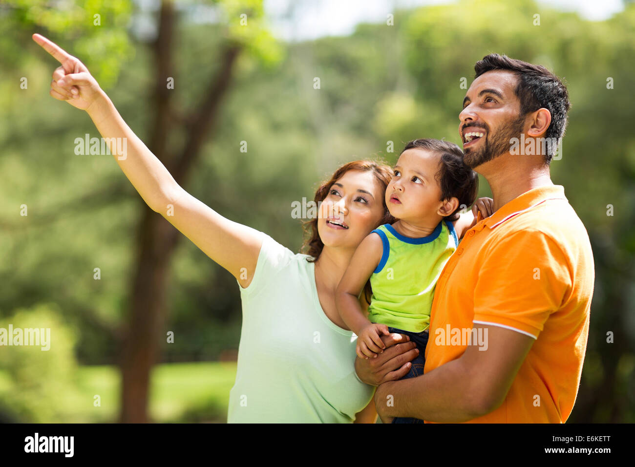 happy young Indian family bird watching outdoors Stock Photo - Alamy