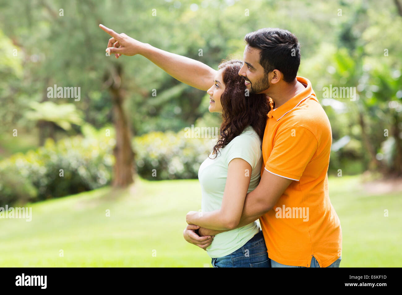 [Image: loving-young-indian-couple-looking-and-p...E6KF1D.jpg]