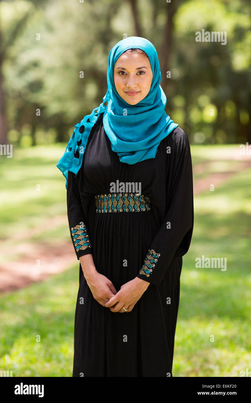 pretty middle eastern woman standing outdoors Stock Photo