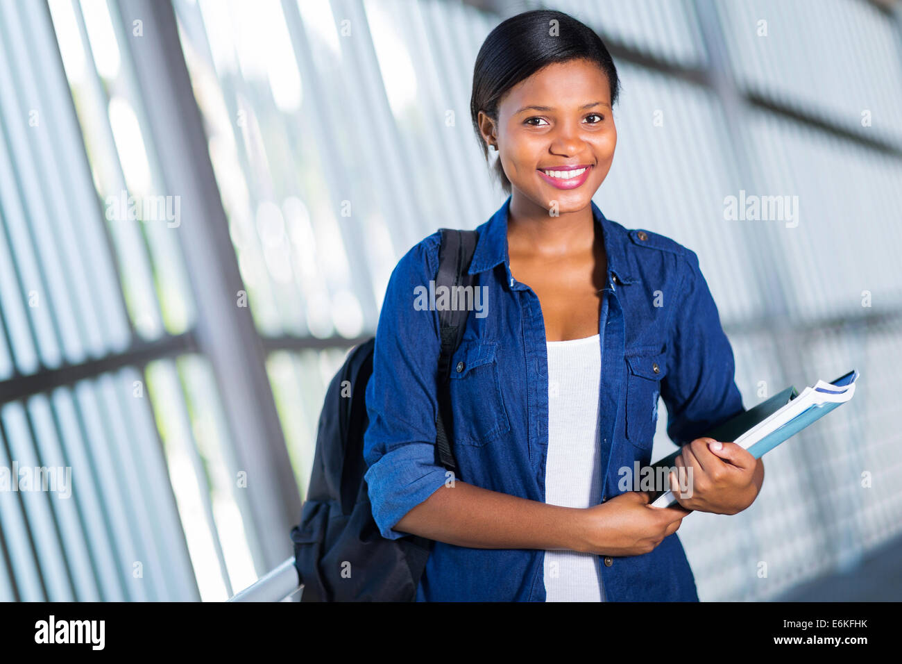 happy female African American college student on campus Stock Photo - Alamy