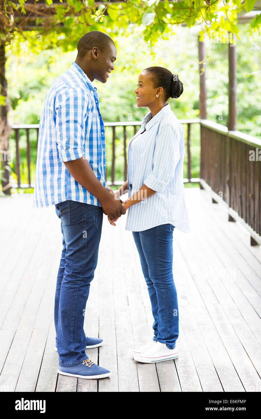 lovely African American couple holding hands outdoors Stock Photo - Alamy
