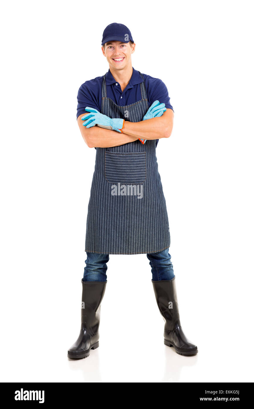 smiling handsome gardener posing on white background Stock Photo - Alamy