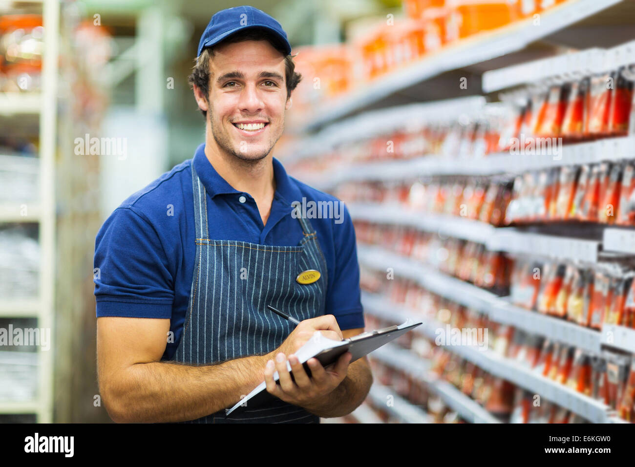 hardware shop storekeeper counting stock Stock Photo Alamy