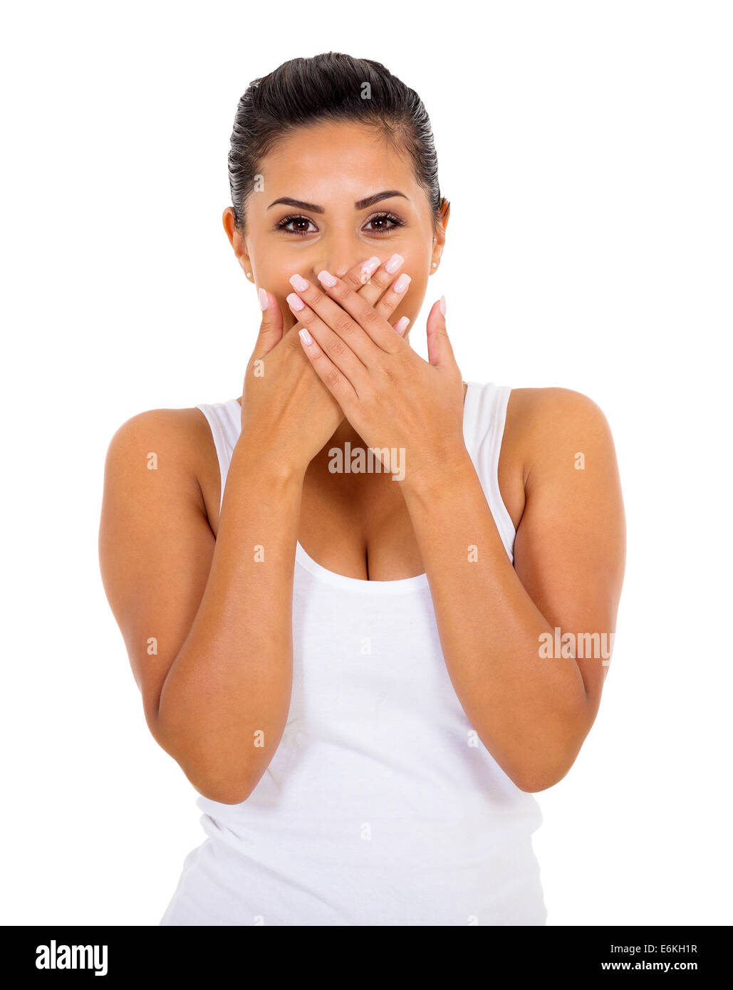 surprised young woman covering her mouth Stock Photo