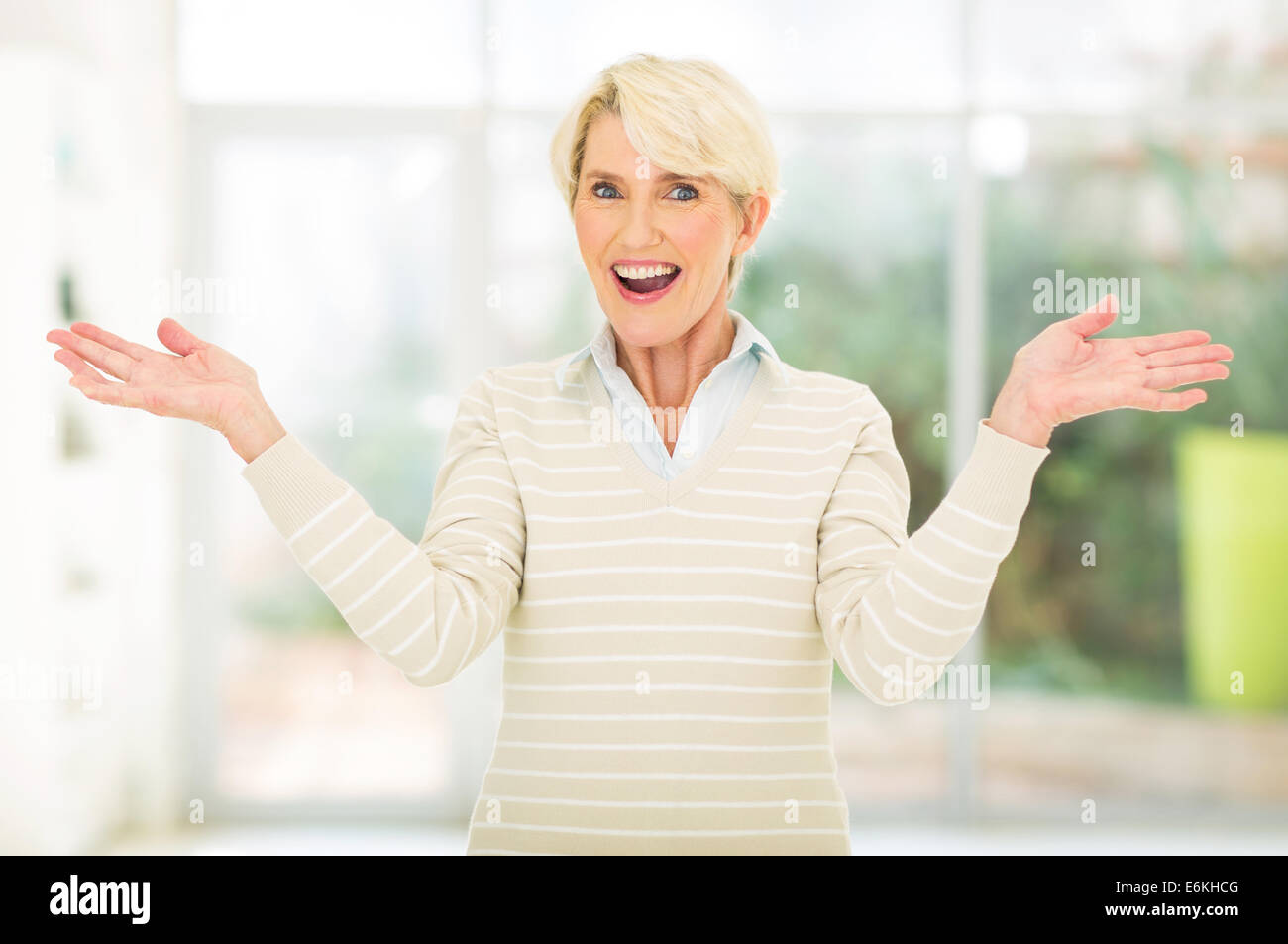 Surprised adult blonde person hi-res stock photography and images - Alamy