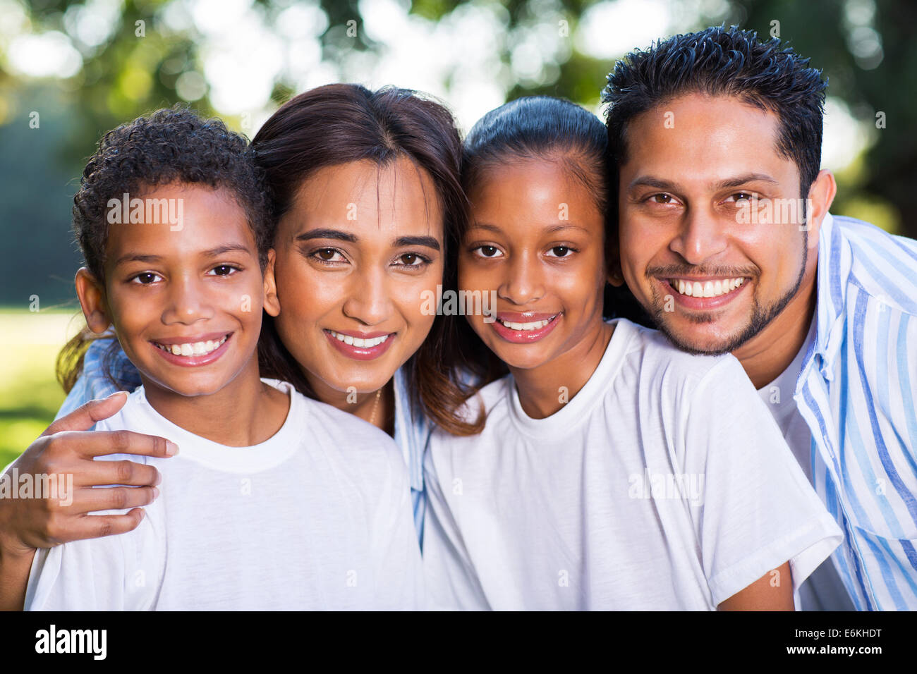 beautiful young Indian family portrait outdoors Stock Photo - Alamy