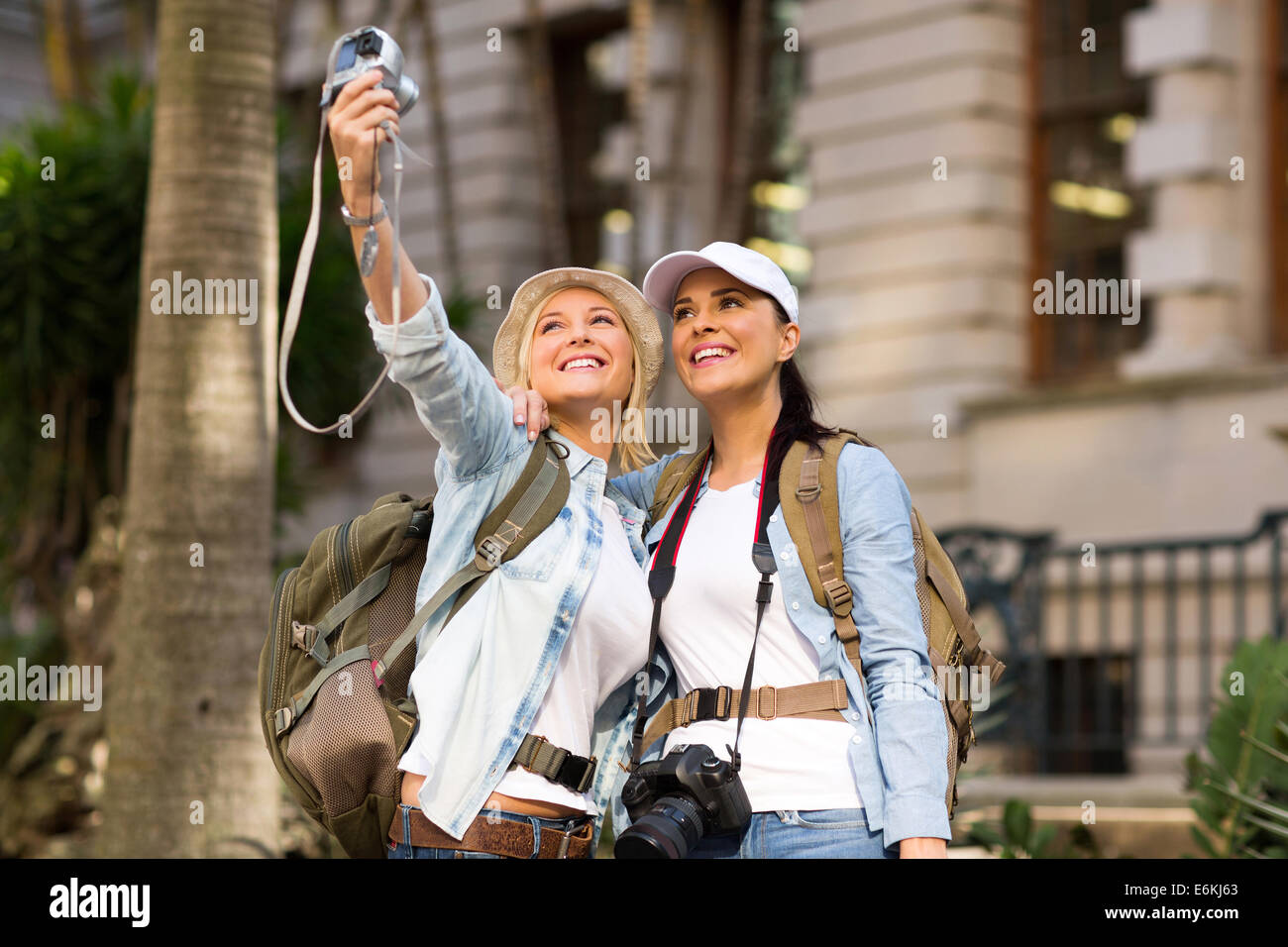 Happy tourists looking at camera hi-res stock photography and images ...