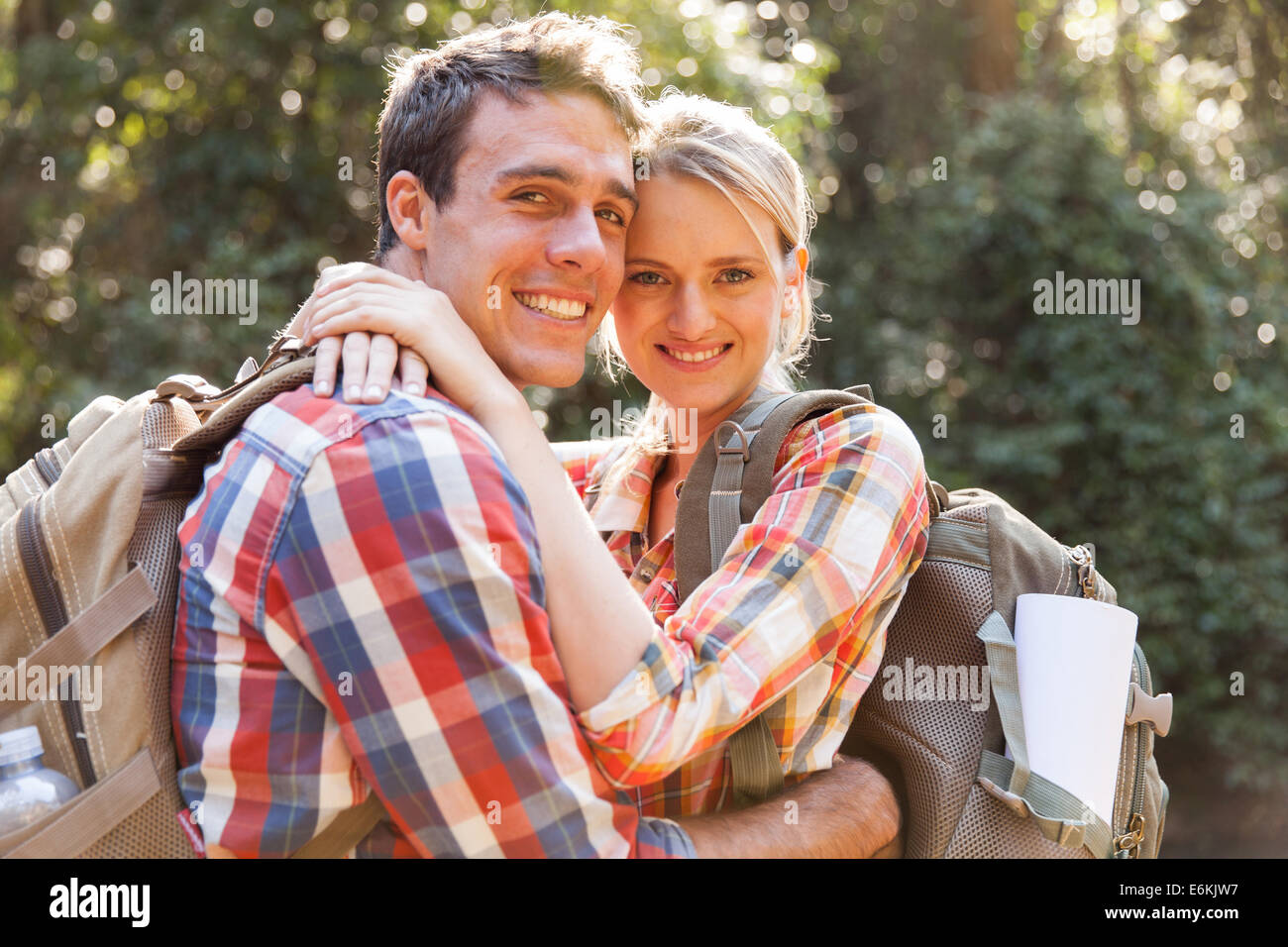 young couple hugging in the forest Stock Photo - Alamy