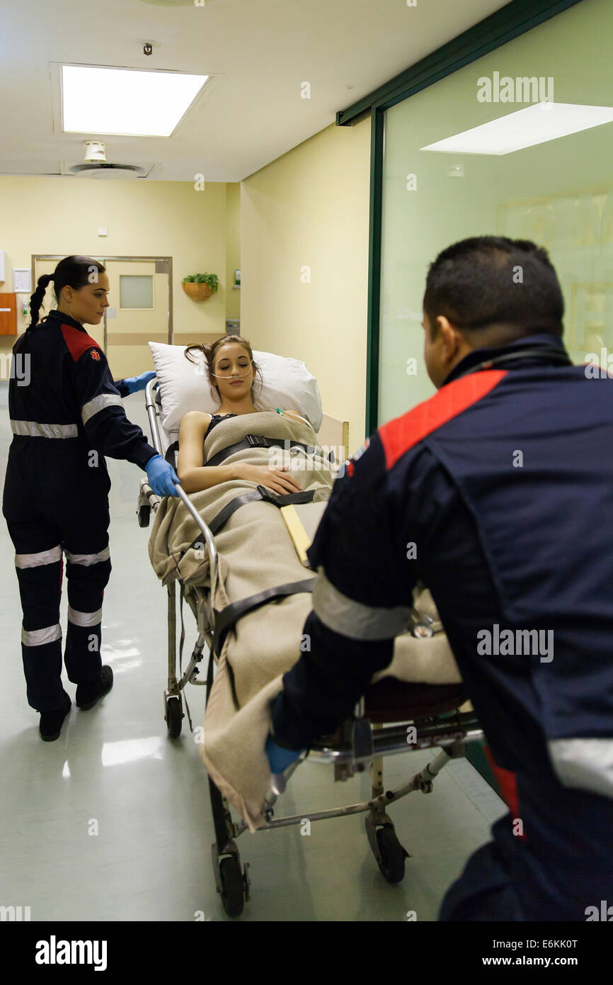 paramedics taking patient to hospital casualty Stock Photo