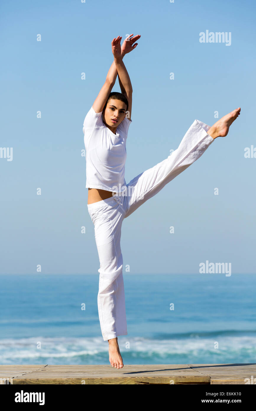 Beautiful woman dancing beach hi-res stock photography and images - Alamy