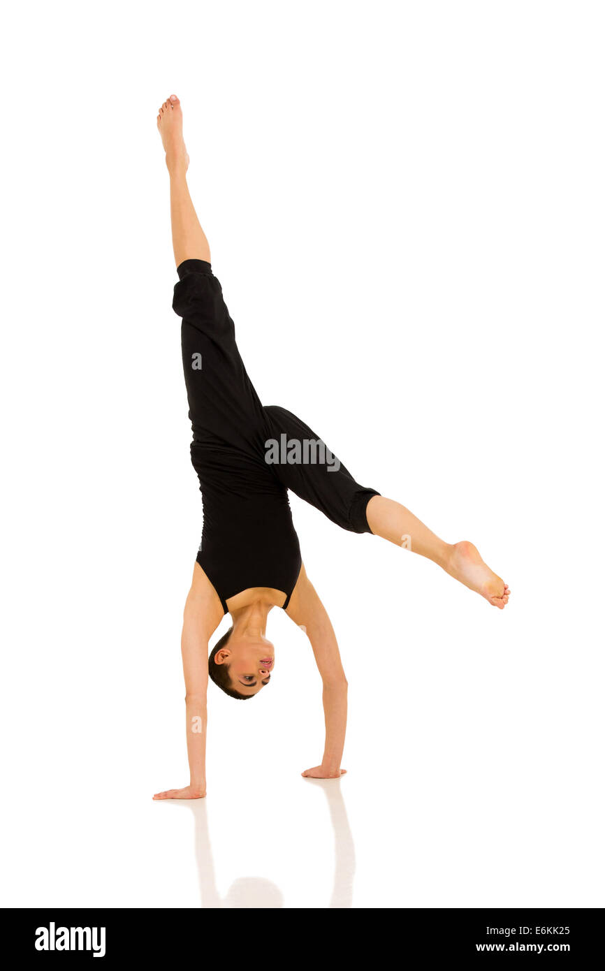 professional female dancer practicing handstand on white background Stock Photo
