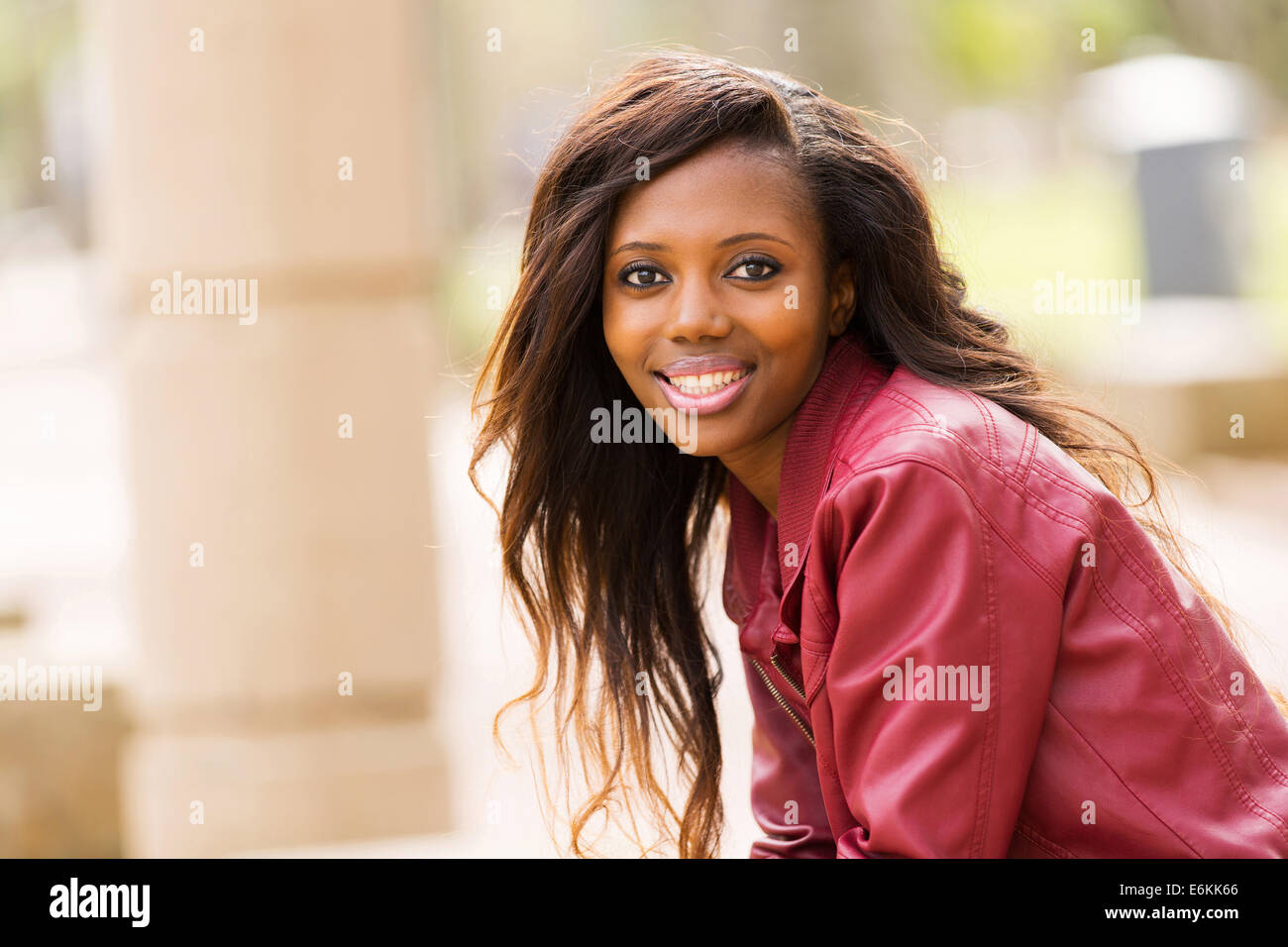 Happy african woman in leather hi-res stock photography and images - Alamy