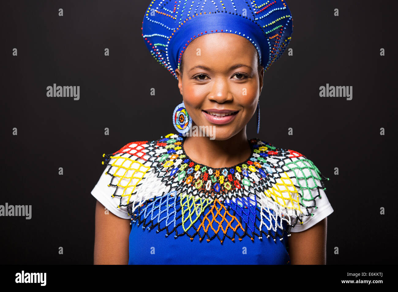 beautiful African woman in traditional clothes portrait on black background Stock Photo