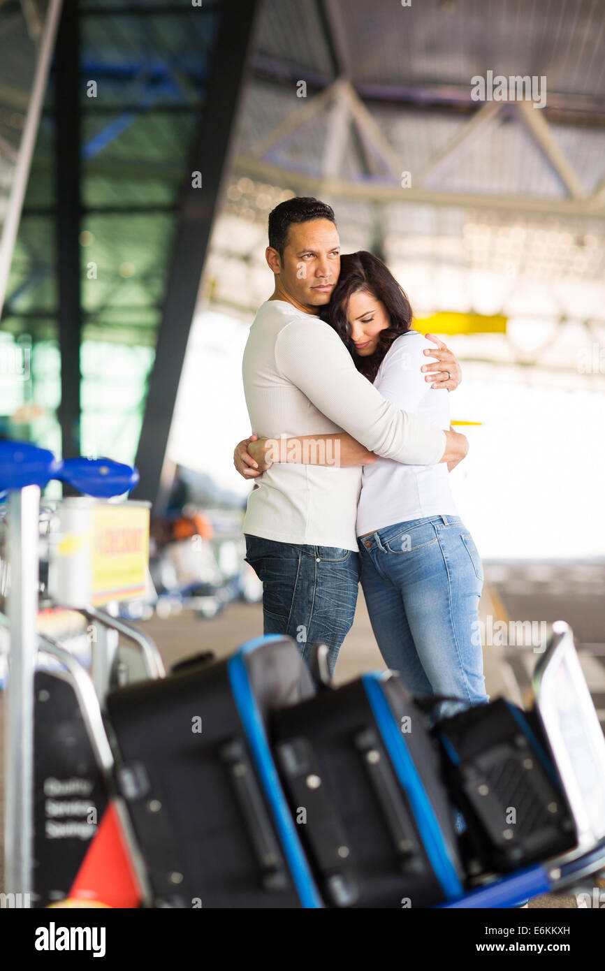 loving married couple parting at airport Stock Photo