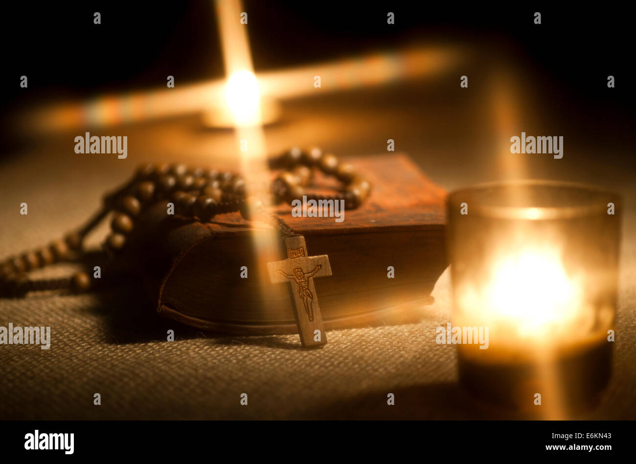Old Holy Bible, Rosary Beads and Candle Stock Photo Alamy