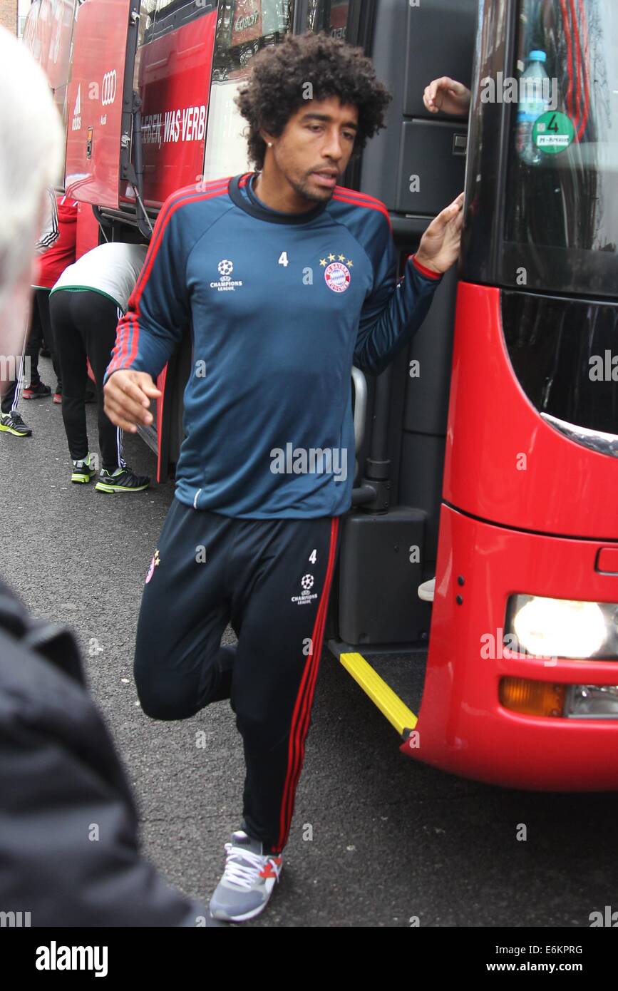 Bayern Munich arrive at Lotus Road, home of Queens Park Rangers, for a training session prior to their UEFA Champions League match with Arsenal FC  Featuring: Dante Where: London, United Kingdom When: 19 Feb 2014 Stock Photo