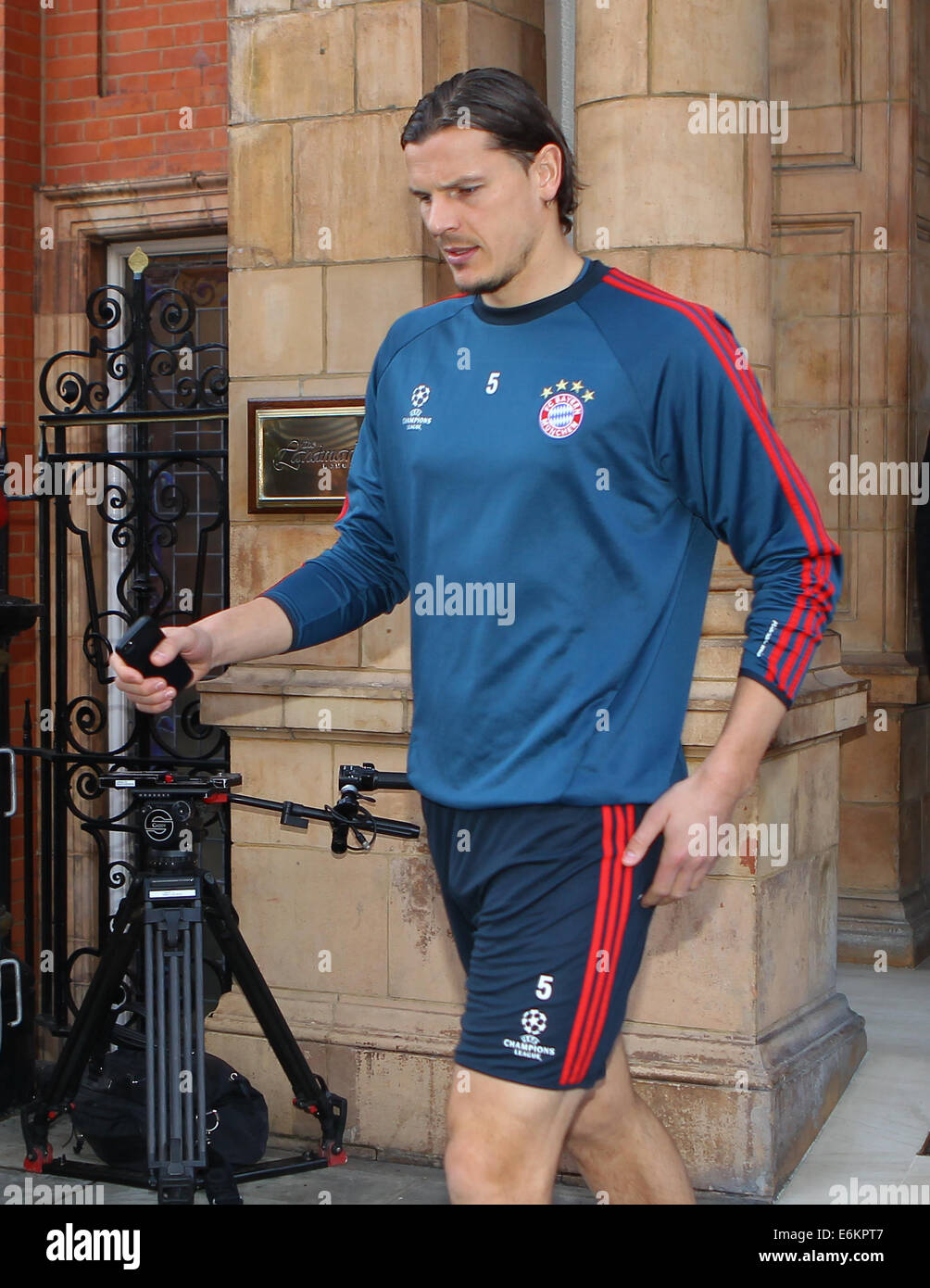FC Bayern Munich leave their London hotel for a training session at QPR's Loftus Road Stadium before tonight's Champions League match against Arsenal  Featuring: Daniel Van Buyten Where: London, United Kingdom When: 19 Feb 2014 Stock Photo