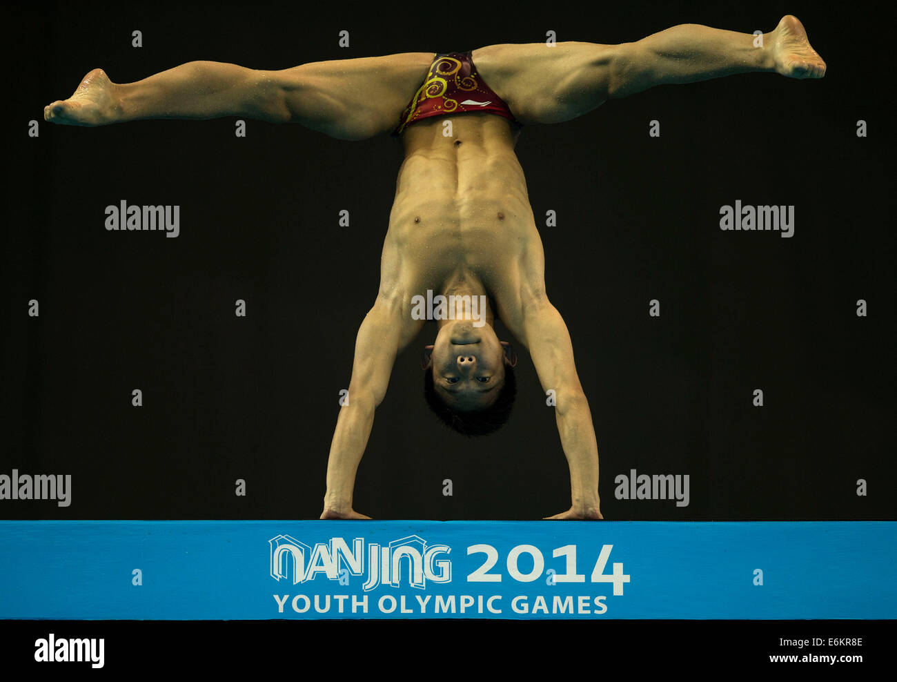 Nanjing, China's Jiangsu Province. 26th Aug, 2014. Yang Hao of China competes during the Men?s 10m Platform final match of diving event at the Nanjing 2014 Youth Olympic Games in Nanjing, capital of east China's Jiangsu Province, on Aug. 26, 2014. Yang Hao won the gold medal. Credit:  Fei Maohua/Xinhua/Alamy Live News Stock Photo