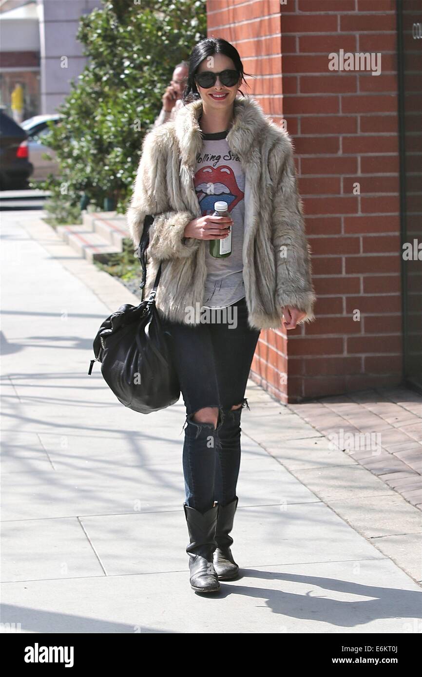 Krysten Ritter, wearing The Rolling Stones T-shirt , walks in Beverly