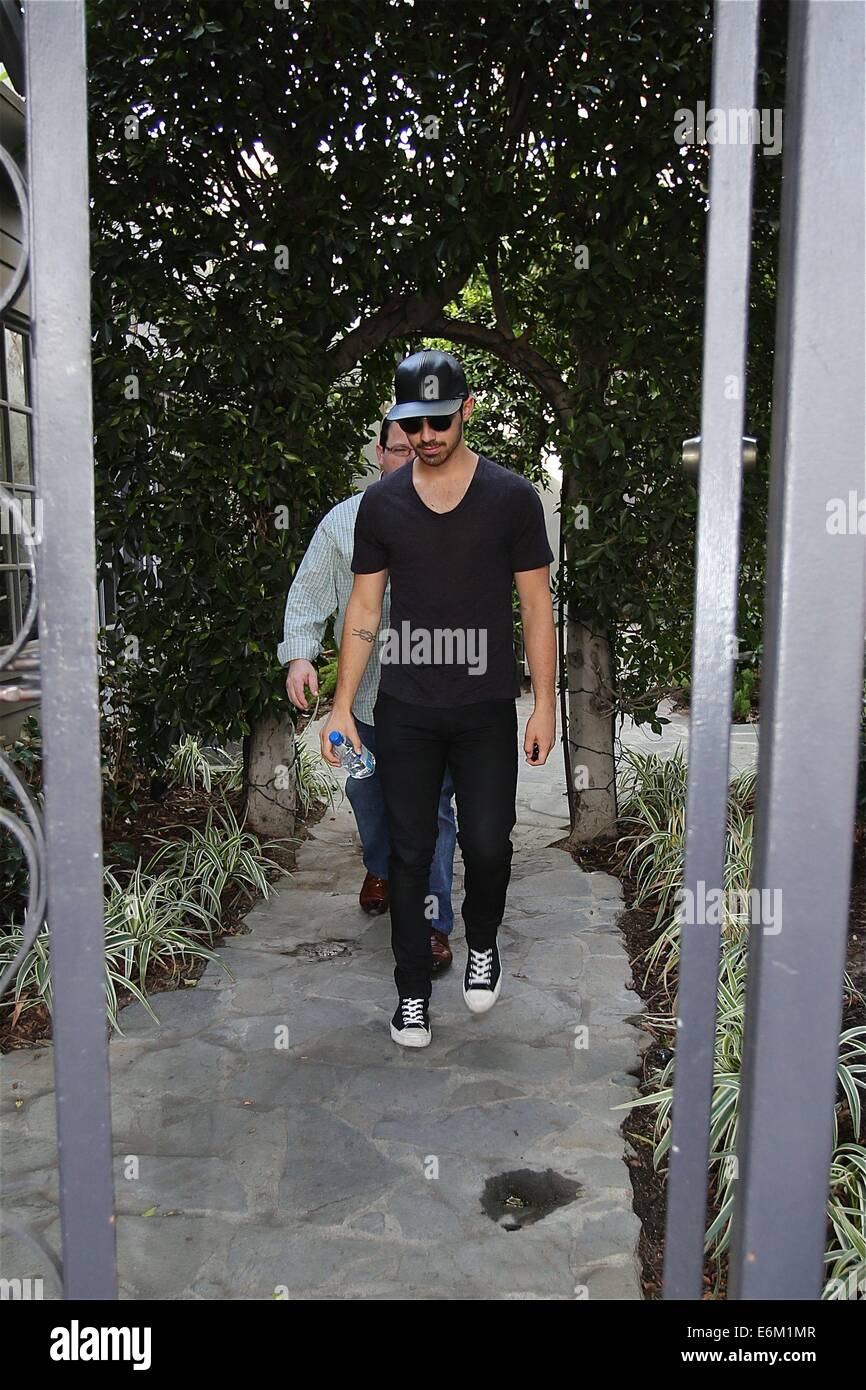 Joe jonas glasses hires stock photography and images Alamy