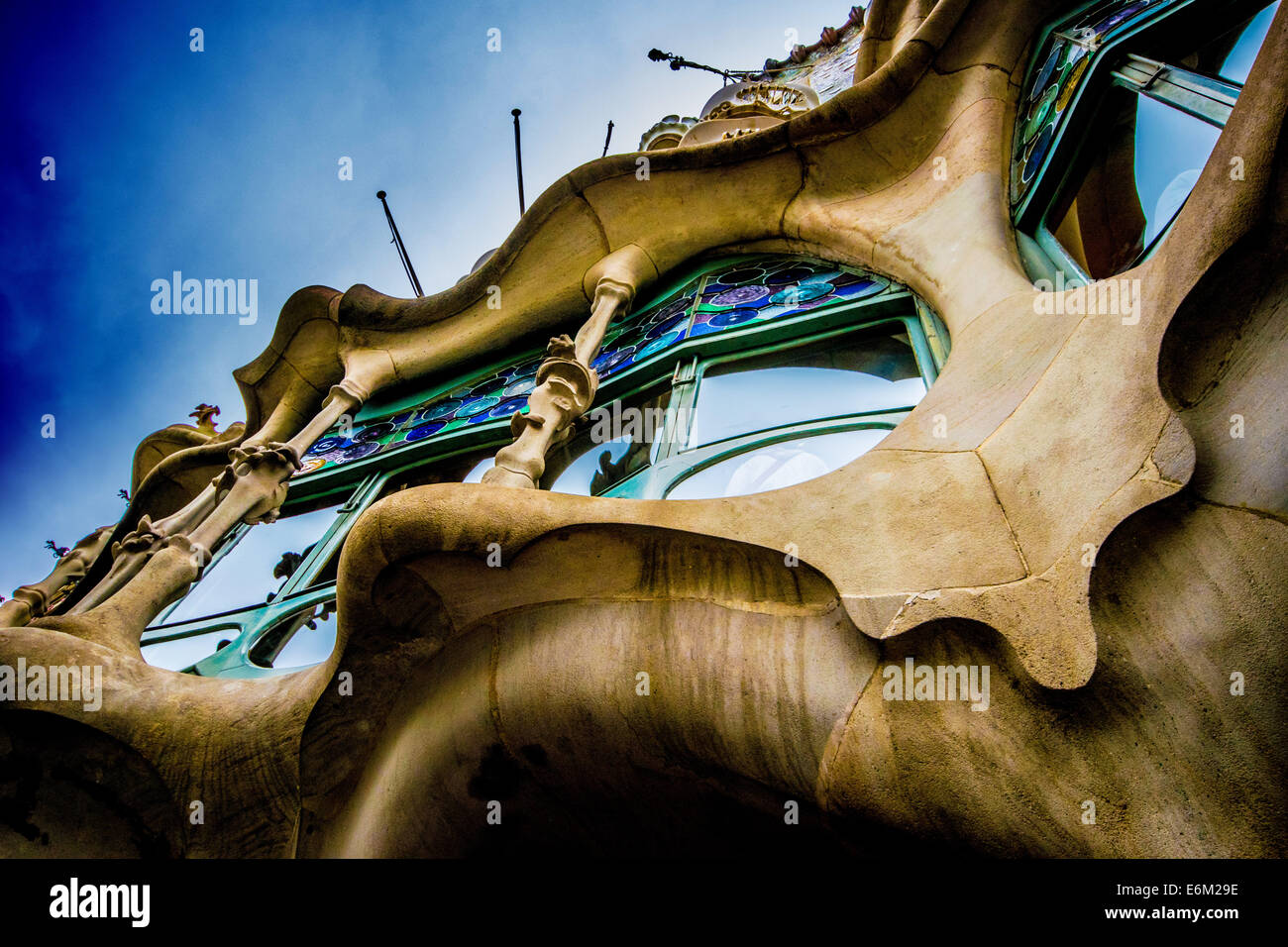 A view from street level looking up at the Casa Batllo, one of Gaudi's masterpieces in Barcelona, Spain Stock Photo