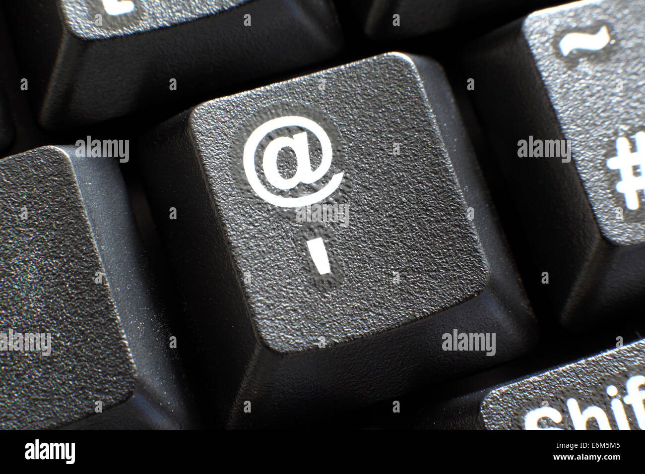 The @ symbol on a computer keyboard. Stock Photo