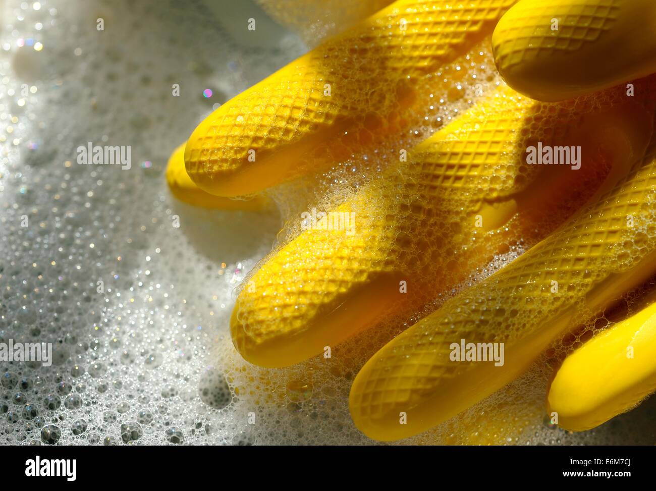 Yellow latex rubber gloves Stock Photo Alamy