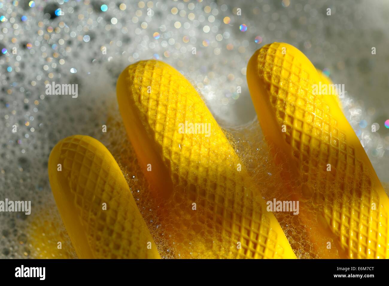 Yellow latex rubber gloves Stock Photo Alamy