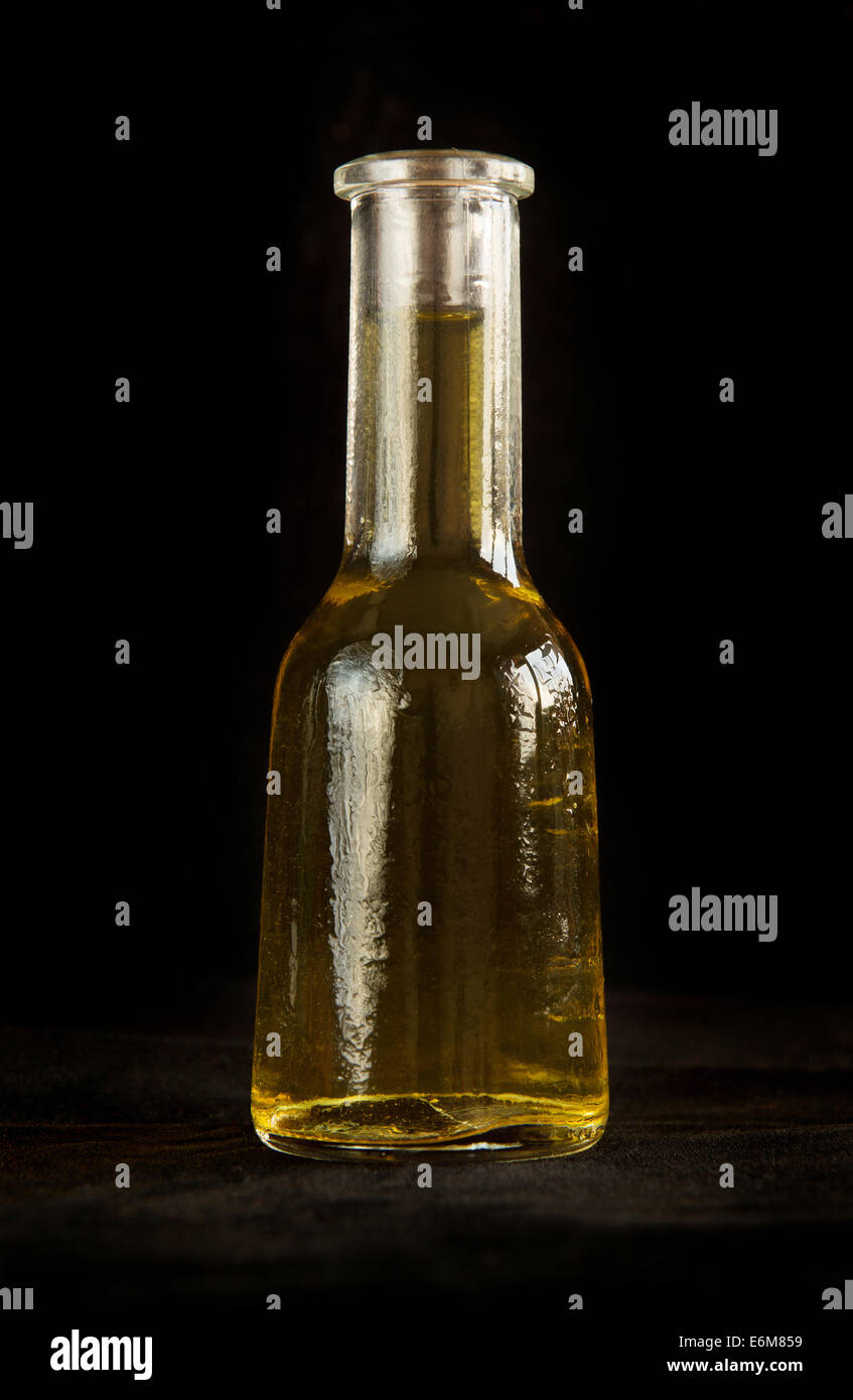 Traditional bulgarian small bottle for grappa on black background Stock Photo
