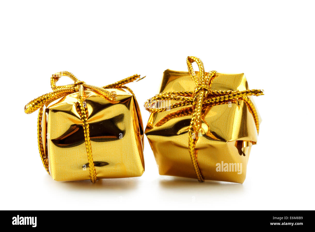 Two golden boxes isolated over white background Stock Photo