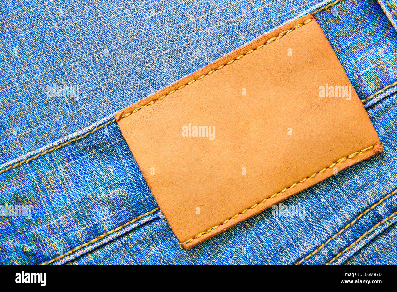 Blue jeans with blank leather label for your own text Stock Photo - Alamy