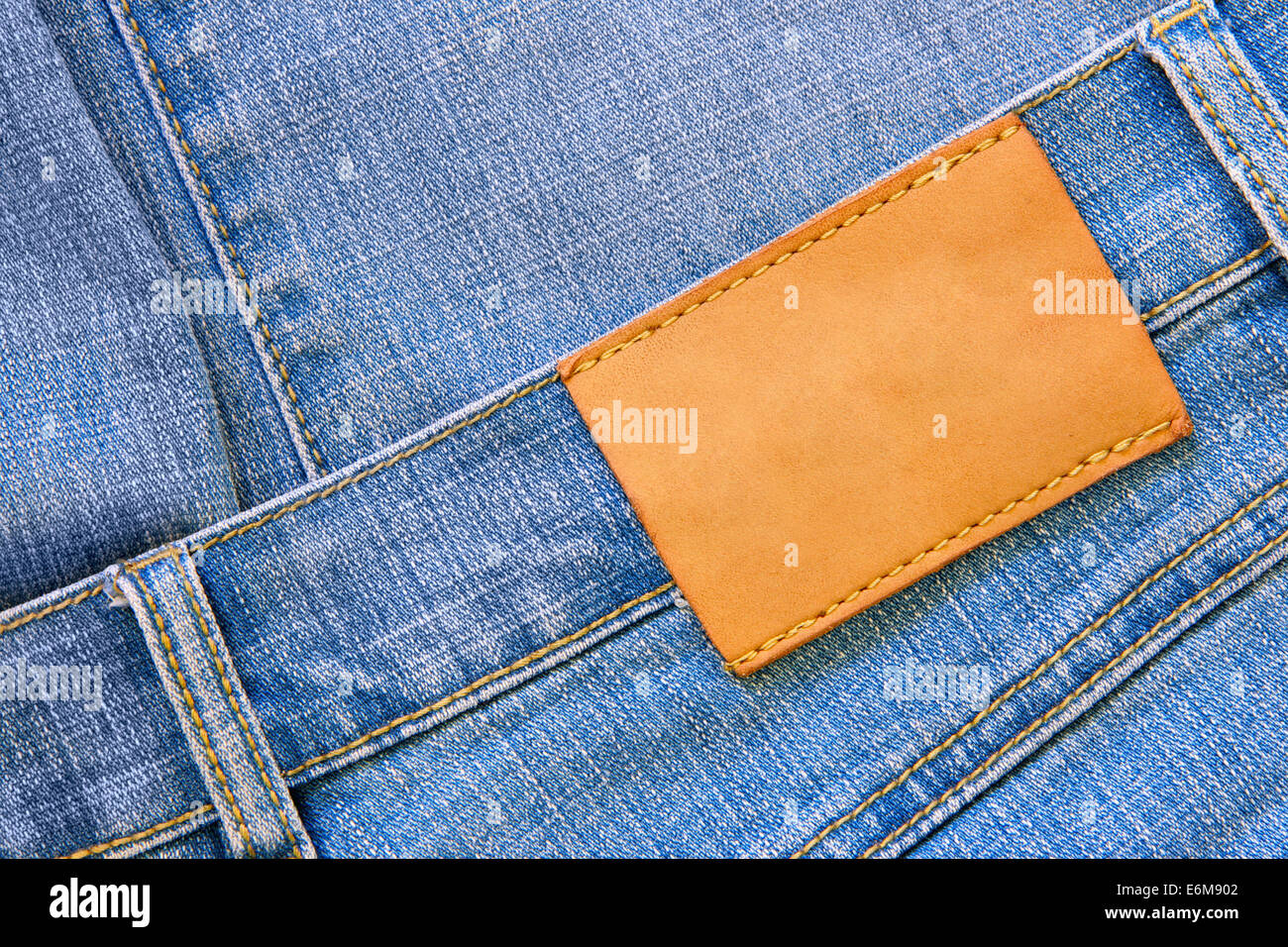 Blue jeans with blank label for your own text Stock Photo - Alamy