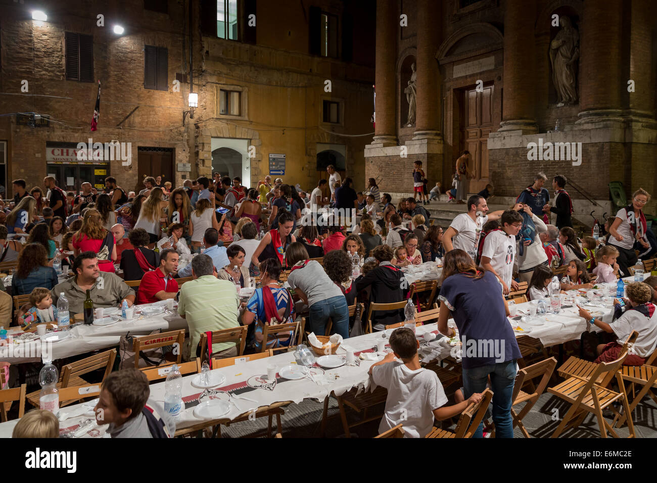 Civetta (little owl) contrada (district) meal before the Palio, Siena, Tuscany, Italy Stock Photo