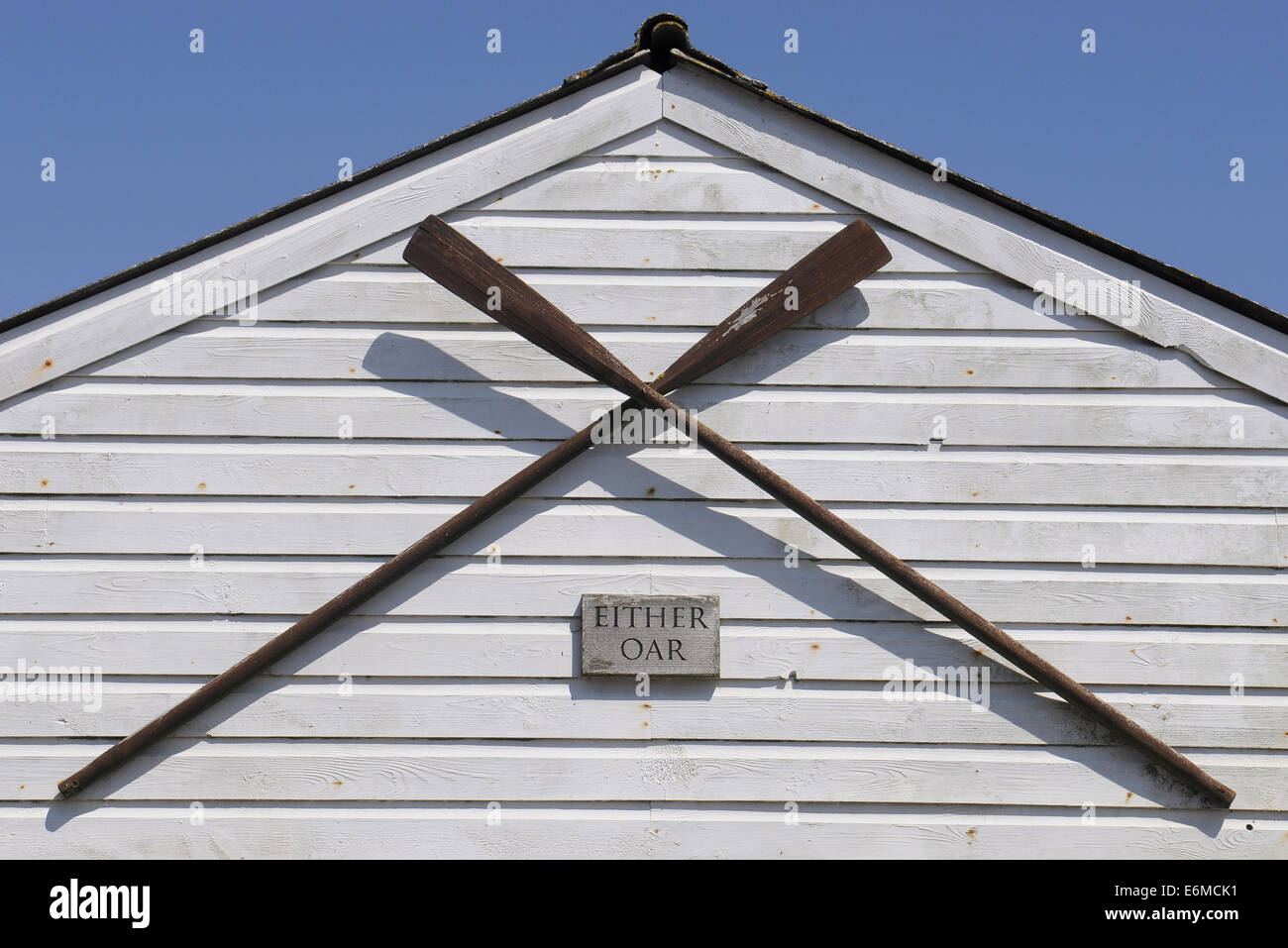 Two Oars Attached To A House With A Sign Either Oar,South Milton,Devon