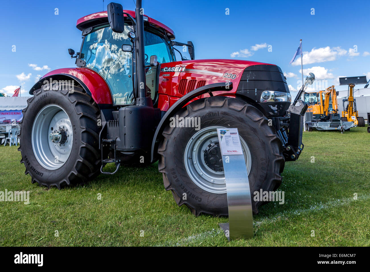 Display of agricultural equipment, Agricultural show, Case IH Puma  tractor, Funen Agricultural show, Odense, Denmark Stock Photo