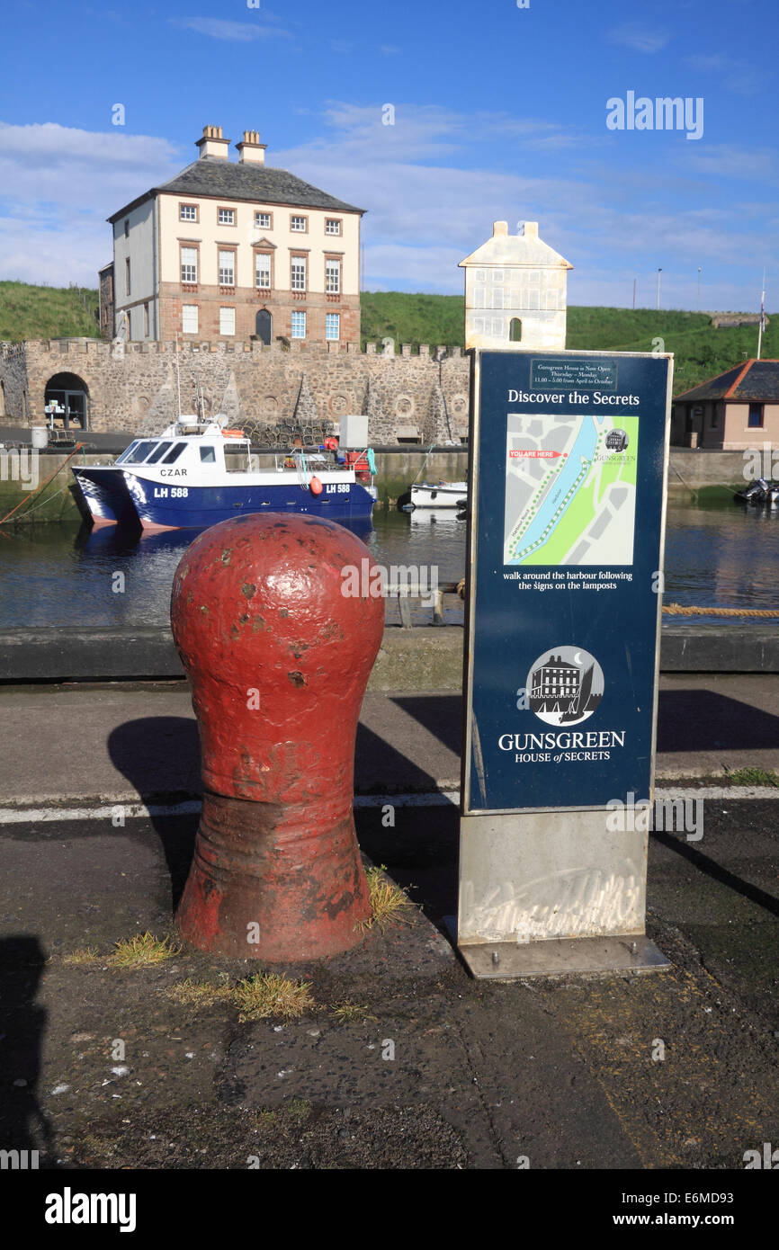 SIgn for Gunsgreen House standing above Eyemouth Harbour, Berwickshire, Scotland Stock Photo