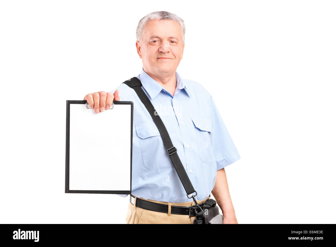 Mature mailman holding a clipboard Stock Photo