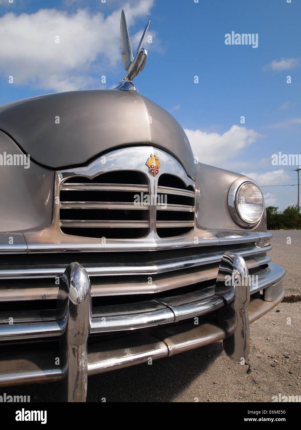 FENWICK ISLAND, DELAWARE - AUGUST 23, 2014: A vintage Packard automobile with swan hood ornament is on display in a parking lot. Stock Photo