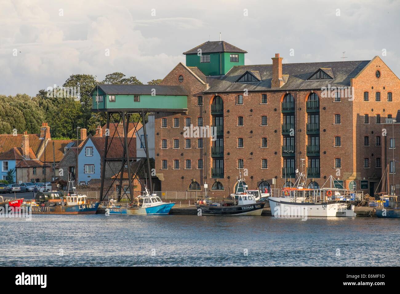 View of the quay at Wells Harbour, featuring the old maltings development. Stock Photo