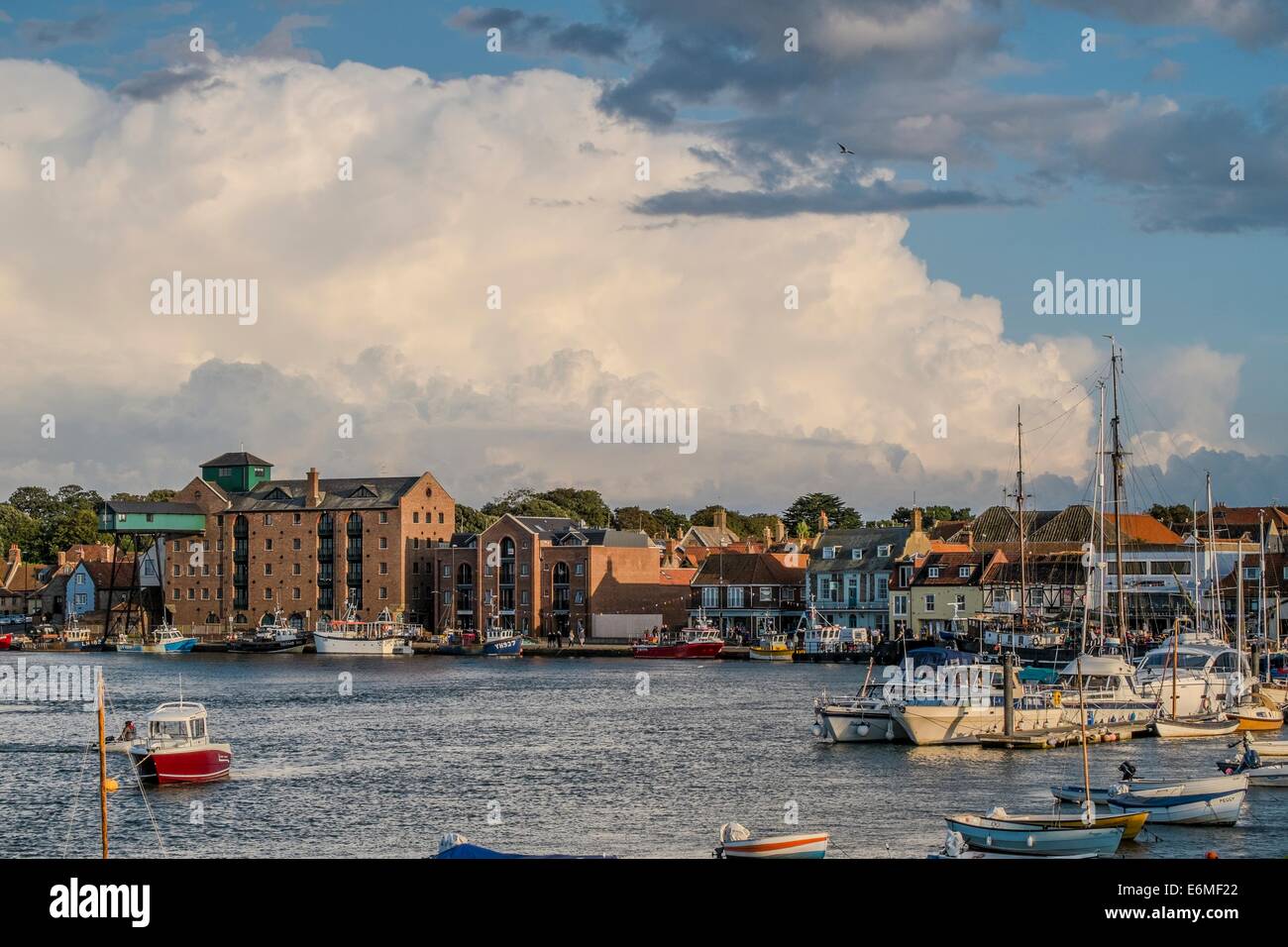 View of the quay at Wells Harbour, featuring the old maltings development. Stock Photo