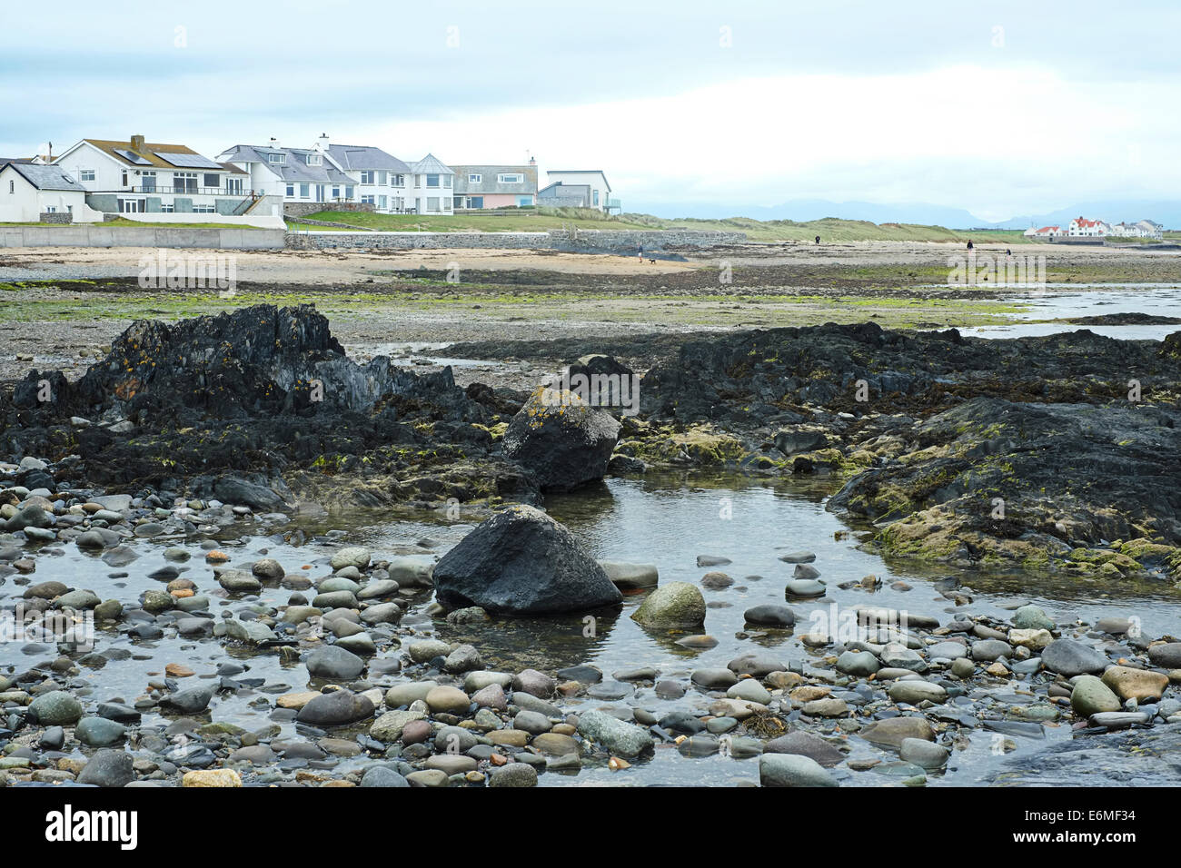 rock pools and houses, Rhosneigr, Anglesey, North Wales Stock Photo Alamy