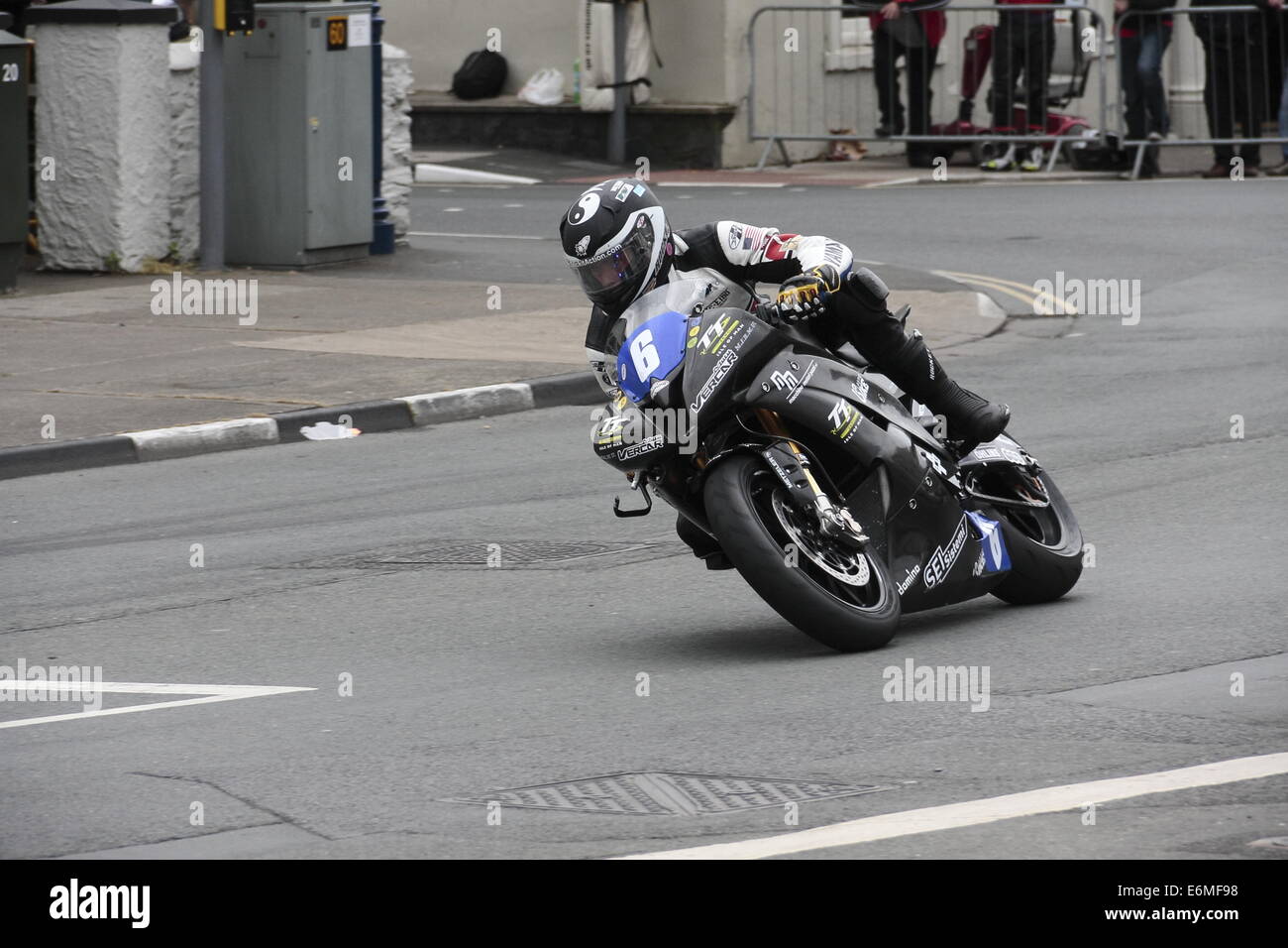 Mark Miller riding through Parliament Square Ramsey on his VercarMoto electric motorcycle, during the Isle of Man TT 2014 Stock Photo