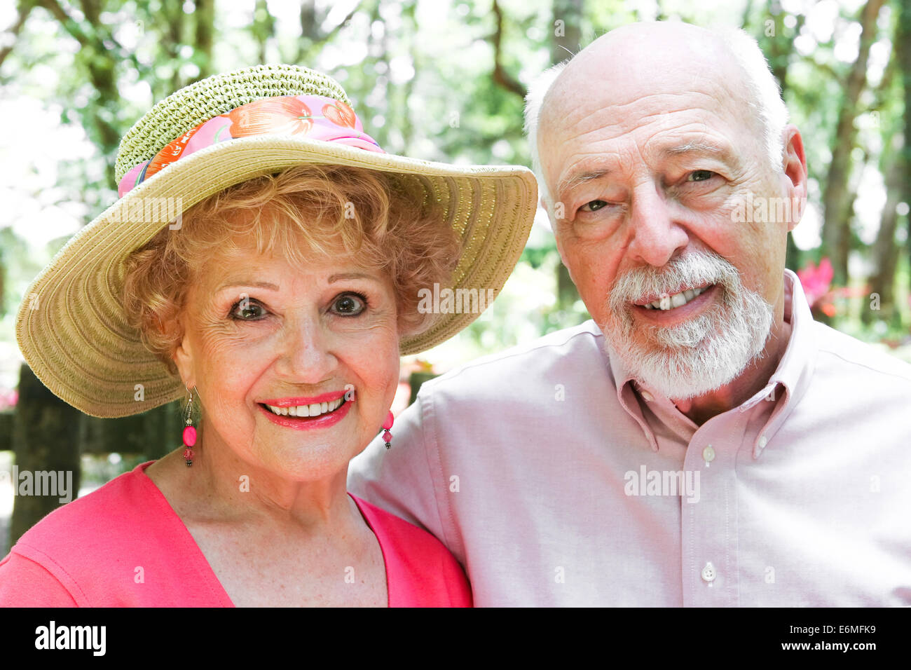 Portrait of senior couple outdoors in park-like setting Stock Photo - Alamy