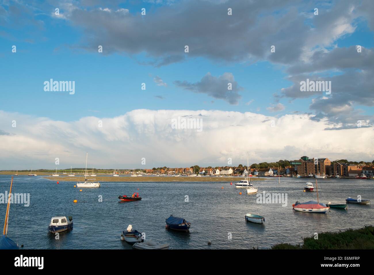 View of Well Harbour with dramtic skies and storm clouds, Stock Photo